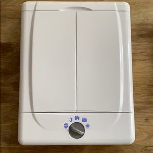 Tri-fold magnifying mirror with light settings